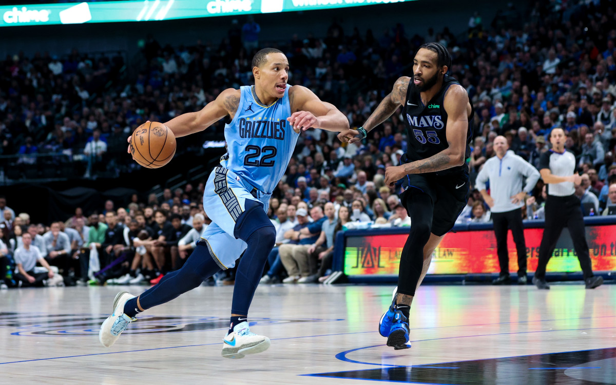 Dec 1, 2023; Dallas, Texas, USA; Memphis Grizzlies guard Desmond Bane (22) drives to the basket as Dallas Mavericks forward Derrick Jones Jr. (55) defends during the second half at American Airlines Center. Mandatory Credit: Kevin Jairaj-USA TODAY Sports
